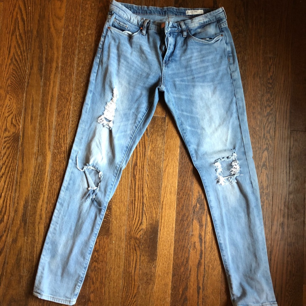 Practically new boutique distressed jeans